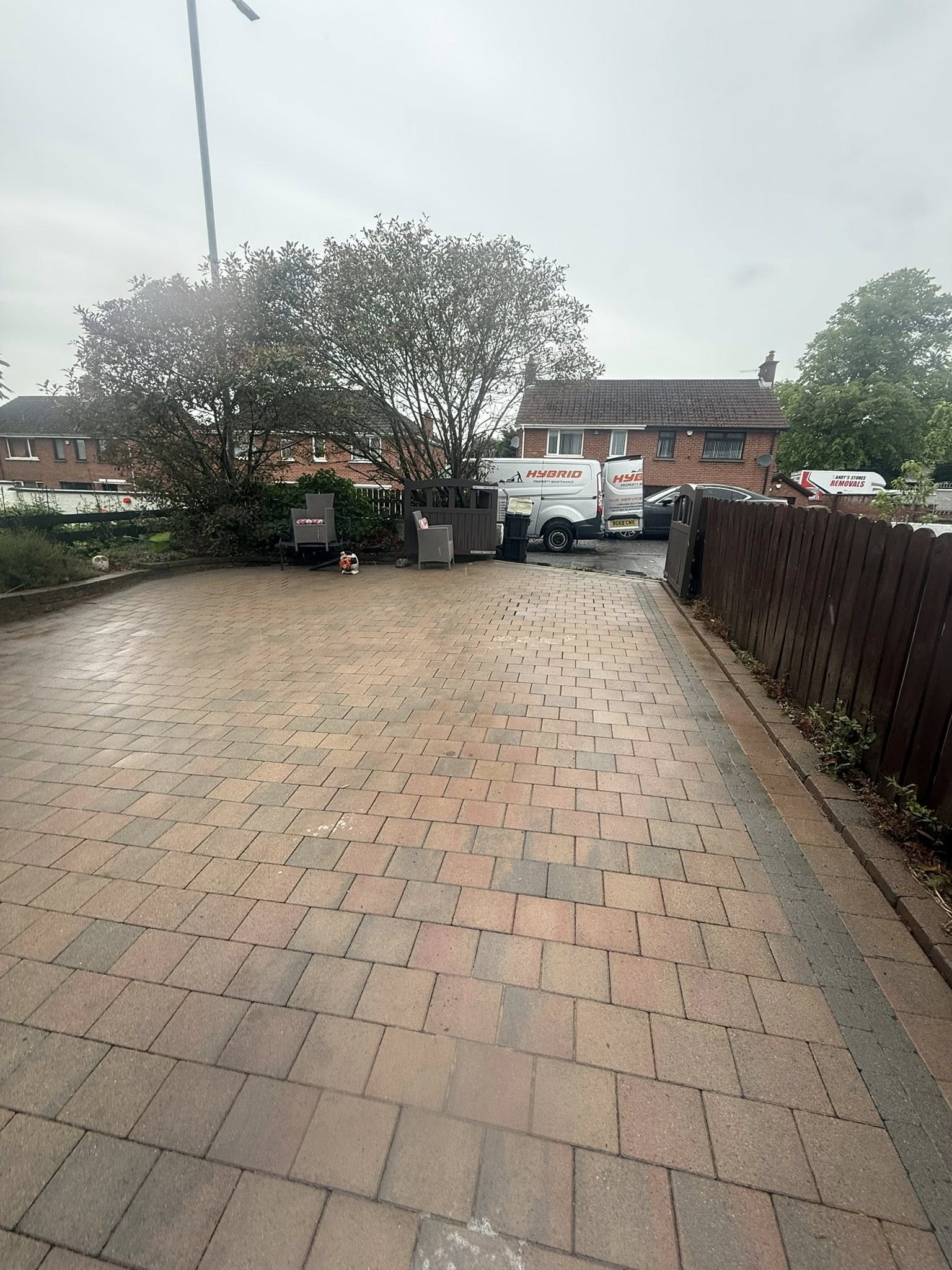 Pressure washing block paving driveway of a house in Newtownabbey